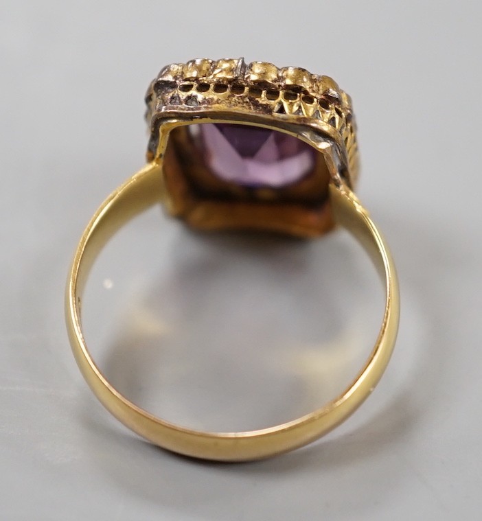 A Victorian 18ct gold, amethyst paste and simulated split pearl cluster set dress ring, size M, gross weight 4.5 grams.